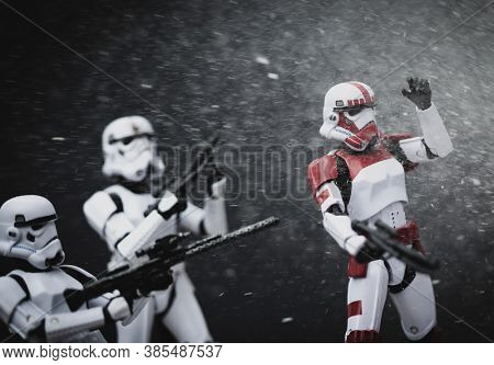 SEPTEMBER 13 2020: Imperial stormtroopers in battle with blast effect - Hasbro action figures