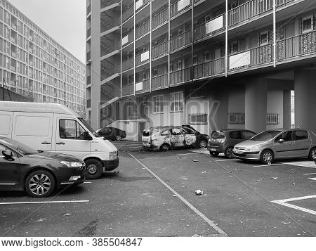Strasbourg, France - Jan 1, 2020: Black And White Image Of Lancia Car Torched During New Year Eve Ma