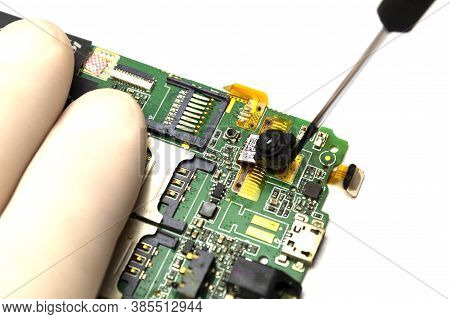 Mobile Phone Repair With Tester And Screwdriver