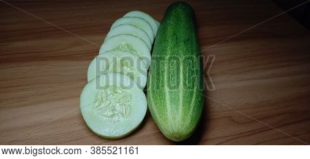 Testy And Healthy Fresh Cucumber On Tree And Cucumber Stock