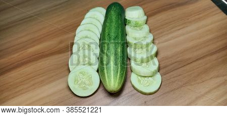 Testy And Healthy Fresh Cucumber On Tree And Cucumber Stock