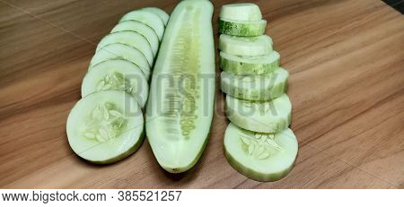 Testy And Healthy Fresh Cucumber On Tree And Cucumber Stock