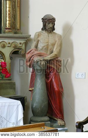 SVETI IVAN ZELINA, CROATIA - JUNE 26, 2013: Christ at the Column, the statue in the parish church of Saint John the Baptist in Sveti Ivan Zelina, Croatia