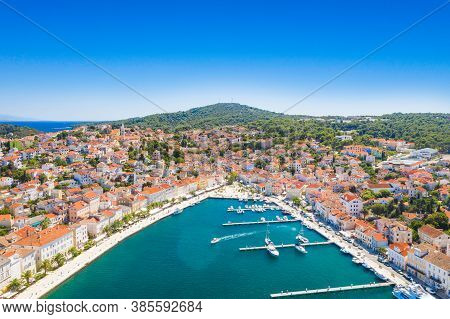 Aerial View Of Town Of Mali Losinj On The Island Of Losinj, Croatia, Marina And Sail Boats On Adriat