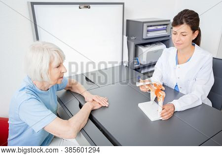 Rheumatologist And Senior Patient, Consultation. Shoulder And Collarbone Injury. Diagnostics And Tre