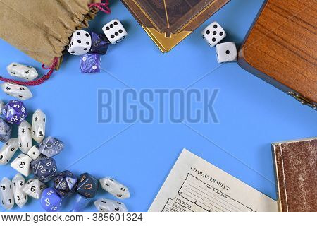 Flat Lay Concept Design For Tabletop Role Playing With Blue And White Rpg Dices, Character Sheet And
