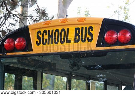 School Bus Sign On The Top Of The Vehicle