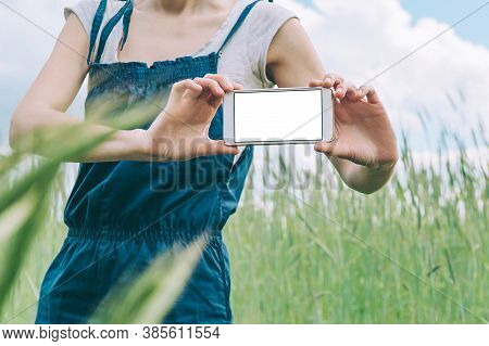 Mock Up Of A Smartphone In The Hands Of A Girl