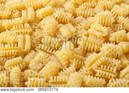 Close Up Of Uncooked Radiatori Pasta Background