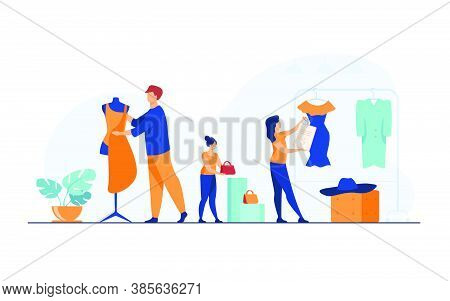Designers Organizing Salesroom In Boutique. People Wrapping Mannequin In Fabric, Hanging Clothes And