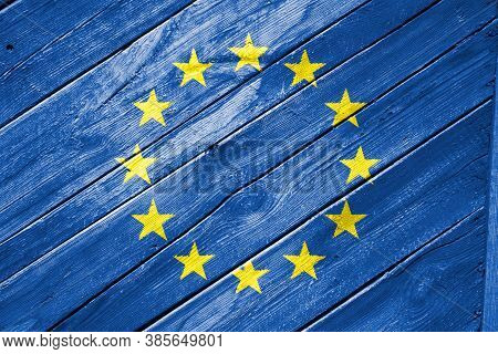 Eu Flag On Texture Background. Background For Greeting Cards For Eu Public Holidays. Europe Day Is C