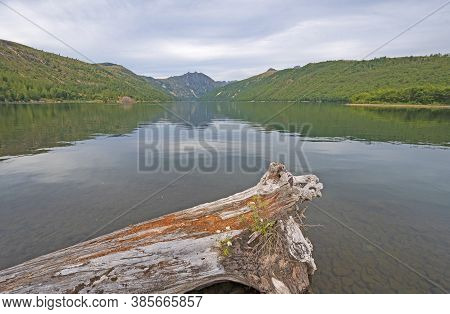 Calm Waters On An Alpine Coldwater Lake In Mount St Helens National Volcanic Monument In Washington