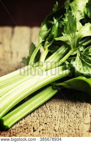 Fresh Celery Stalks, Vintage Wooden Background, Selective Focus