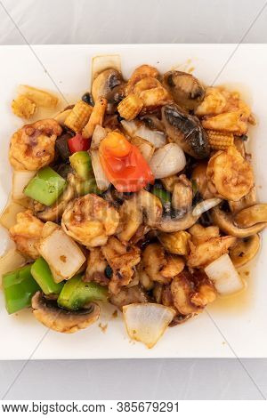 Appetizing Plate Tempting The Tastebuds With Shrimp In Black Bean Sauce In Perfect Serving Size.