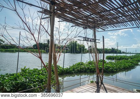 Nakornpathom / Thailand - September 5 2020: Floating Raft For Photo Shoot Along The River At Tree & 