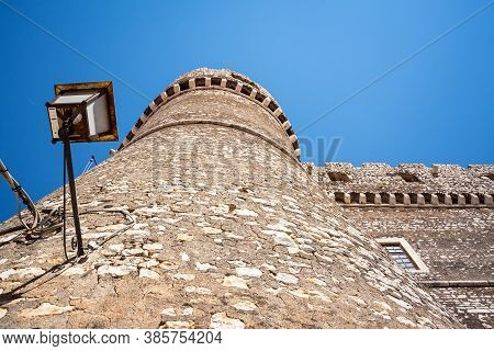 The Stone Walls And The Tower Of The Famous Caetani Castle Of Sermoneta, Little Medieval Town In The