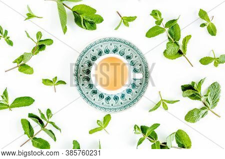 Mint Tea With Frame Made Of Mint Leaves Isolated On White Background. Set Of Peppermint. Mint Patter
