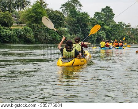 Vangvieng/lao-10 Dec 2017::unacquainted Tourist Kayaking On Namsong River At Vangvieng City Laos.van