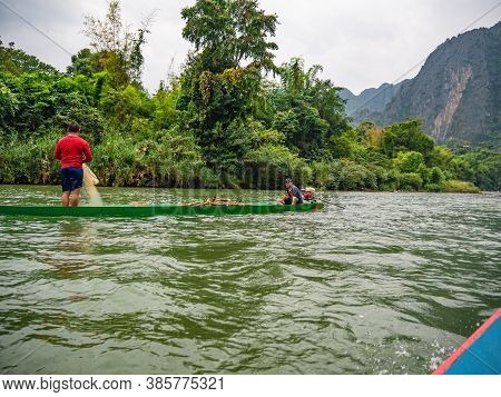 Vangvieng/lao-10 Dec 2017:unacquainted Local People Fishing On Namsong River At Vangvieng City Laos.
