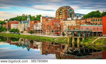 Augusta, Maine, USA skyline on the Kennebec River in the morning.