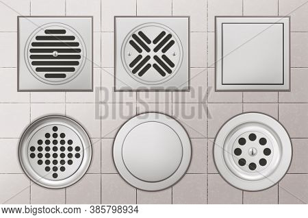 Shower Drainage Holes With Stainless Covers On White Tiled Floor Background, Drain Sewers Of Round A