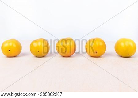 Yellow Plum Fruit On The White Background Isolated