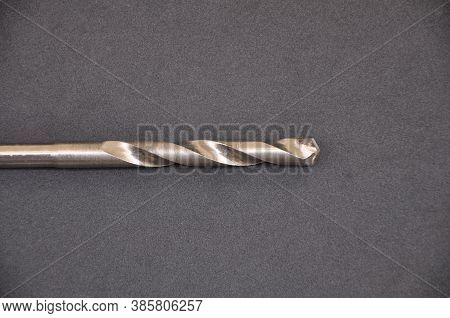 Steel drill. Steel drill for use in impact drill, for manual work in photo zoom with black background in copy space, Brazil, Sout America