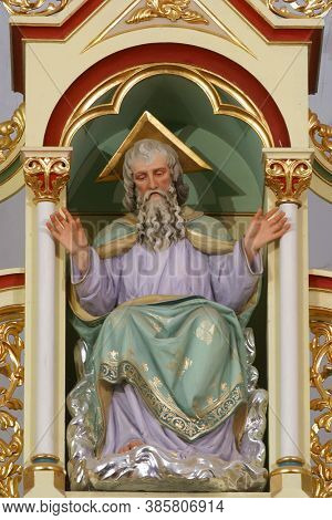 SVETI IVAN ZELINA, CROATIA - JUNE 26, 2013: God the Father statue on the high altar in the parish church of Saint John the Baptist in Sveti Ivan Zelina, Croatia