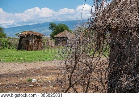 Traditional Maasai Village With Clay Round Huts In Engare Sero Area Near Lake Natron And Ol Doinyo L