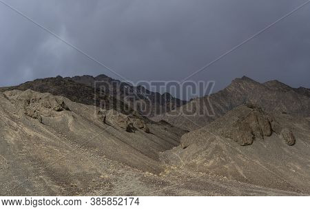 Bare Mountain In The Valley Of The River Murghab With Dark Rain Clouds Near The Village Of Murghab, 