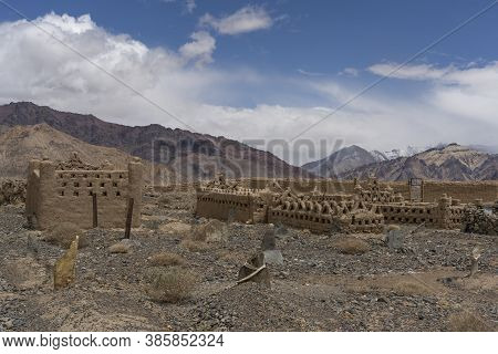Graveyard With Old Abandoned Mud Graves And Tombs In Murghab In Tajikistan.