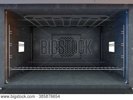 An Open Empty Household Kitchen Oven With A Brushed Metal Finish And Modern Illuminated Dials On An 