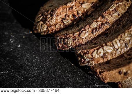 Fresh Whole Grain Seeded Bread, Organic Wheat Flour, Closeup Slice Texture As Background For Food Bl