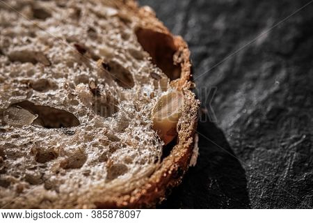 Fresh Whole Grain Seeded Bread, Organic Wheat Flour, Closeup Slice Texture As Background For Food Bl
