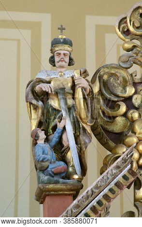 SLANI POTOK, CROATIA - JUNE 11, 2013: Saint Martin statue on the high altar in the chapel of Saints Fabian and Sebastian in Slani Potok, Croatia