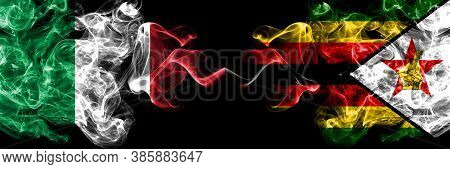 Italy Vs Zimbabwe, Zimbabwean Smoky Mystic Flags Placed Side By Side. Thick Colored Silky Abstract S