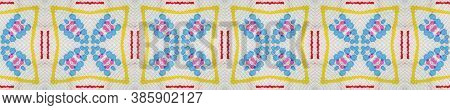 Ethnic Textile. Abstract Ikat Motif. Green, Red, Yellow, Blue Seamless Texture. Repeat Tie Dye Illus