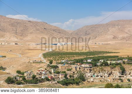 Panoranic View Of Hasankeyf Landscape. Houses, Caves Near The Tigris River And Surrounding Mountains