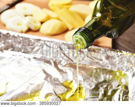 Put The Olive Oil For Prepair Food Potatos