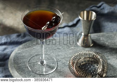 Refreshing Boozy Black Manhattan Cocktail