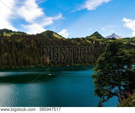 Lost In The Mountains Of Switzerland, Lake Arnesee With Crystal Clear Waters Of Turquoise And Azure