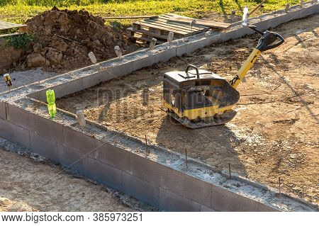 Vibratory Plate Compactor Under Construction. Vibratory Plate Compactor In Construction Site. Constr