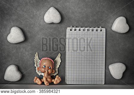 Little Cute Cupid And Hearts. Notebook Paper. Mockup. Symbol Of Love. Card For Valentine\'s Day