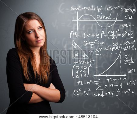 Ragazza bella giovane scuola pensando di segni matematici complessi