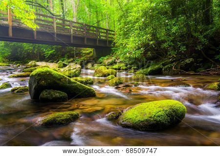 Cascades And Walking Bridge Over The Oconaluftee River, At Great Smoky Mountains National Park, Nort