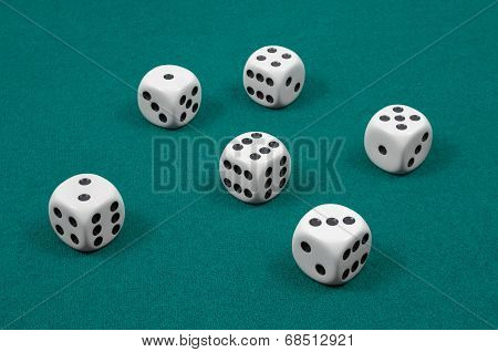 White Dice On Green Felt