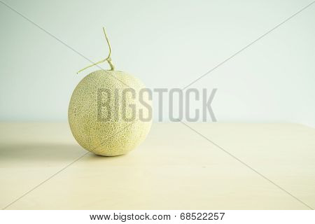 Cantaloupe melon over wooden