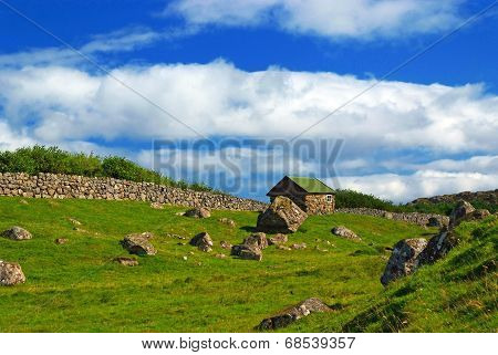 Traditional house with turf roof in Saksun, Faroe Islands