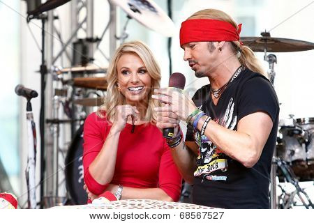 NEW YORK-JUL 18: Singer Bret Michaels (R) and Elisabeth Hasselbeck at Fox and Friends' All-American Summer Concert Series on the corner of 48th Street and 6th Avenue on July 18, 2014 in New York City.