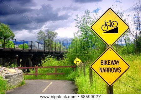 Bikeway narrows sign on bike path in Kalispell, Montana